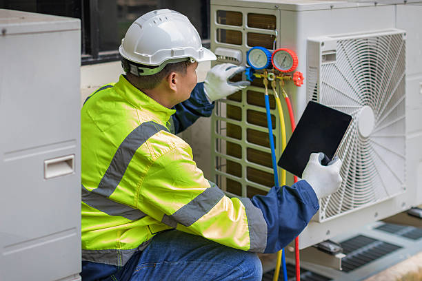 Professional Ac Installation technician working in Lake Station, IN